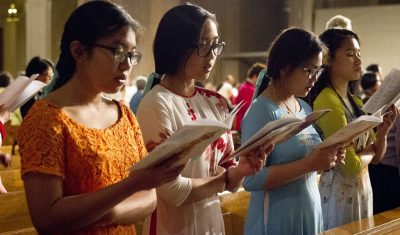 girls worship in great upper church during pilgrimage