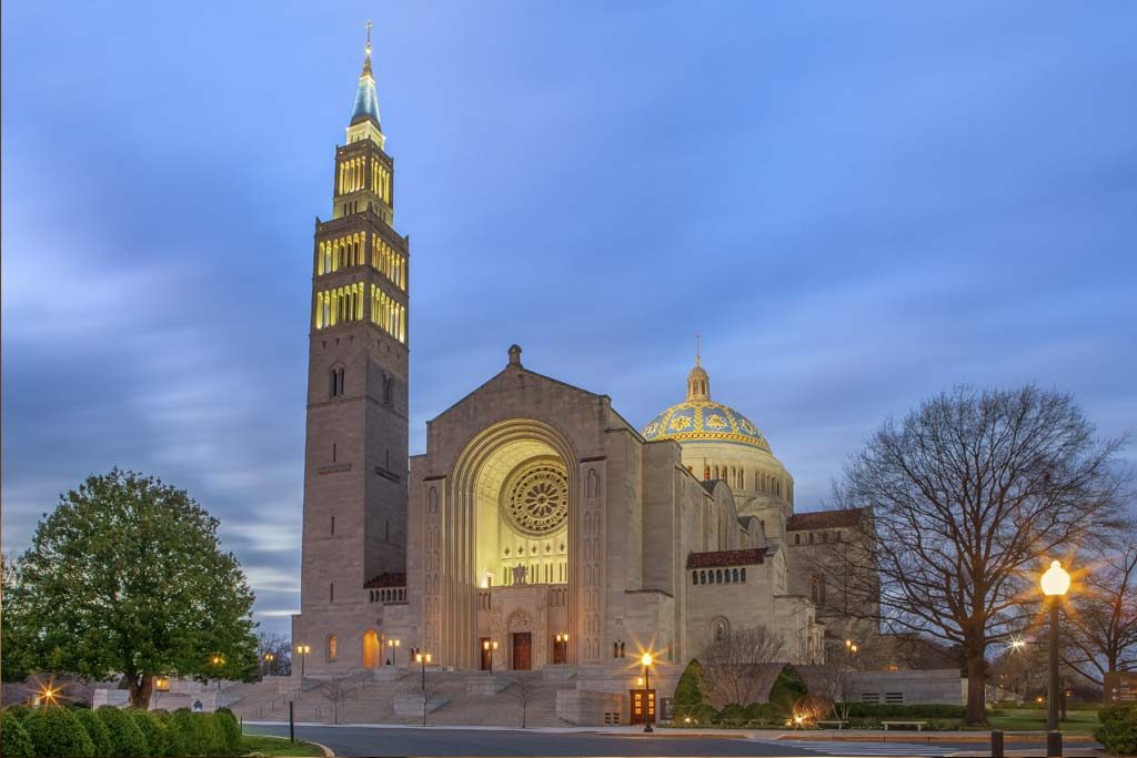 Basilica front exterior at dusk