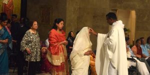 Pilgrims in line to receive a blessing at Mother of Miracles Pilgrimage