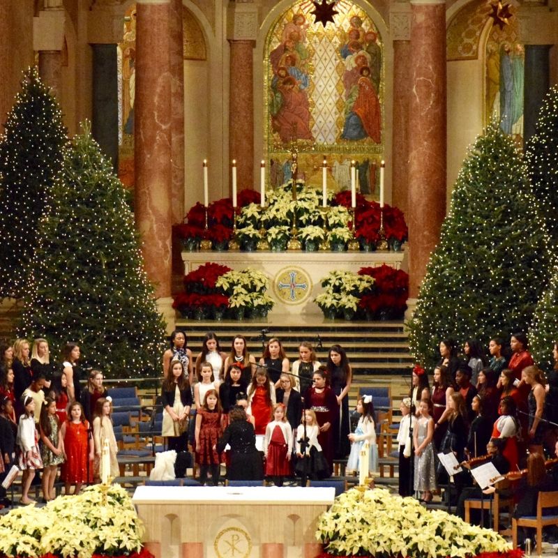 Children's choir sings at basilica christmas eve