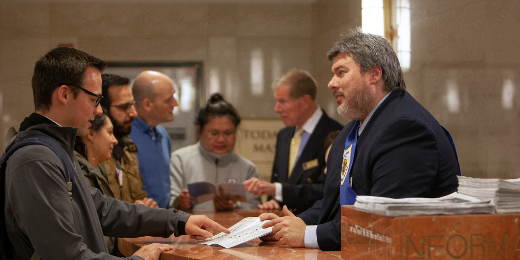 Basilica docent talking to visitor