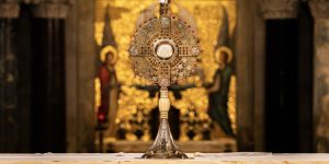 A monstrance is shown sitting atop an altar in the Crypt Church