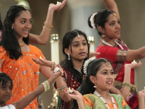 Children dance in ethnic pilgrimage