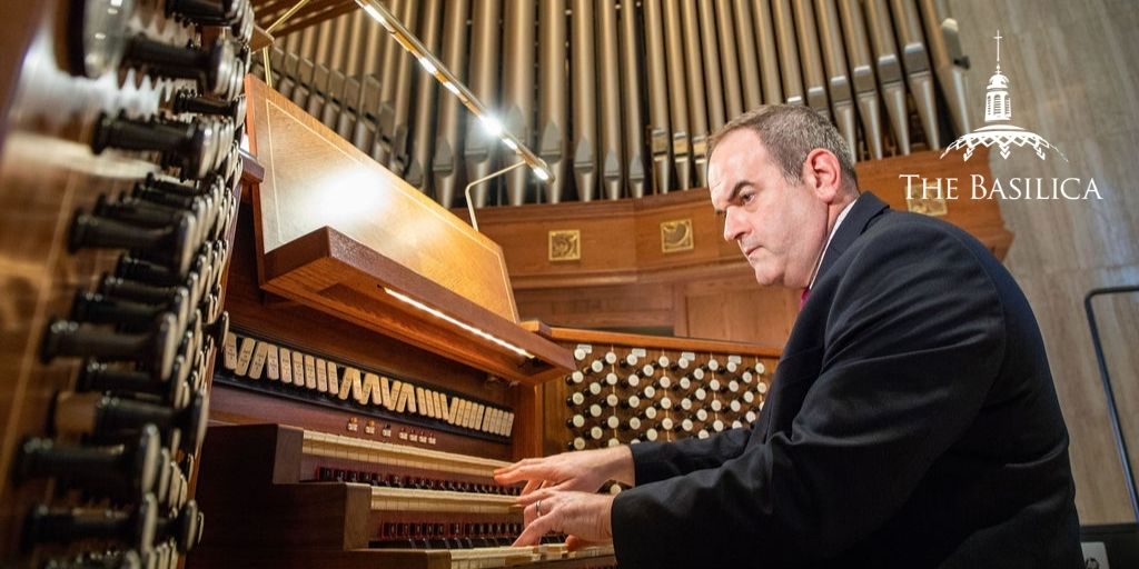 Peter Latona plays the organ at the Basilica