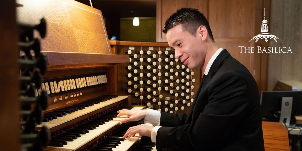 Andrew Vu plays the organ at the Basilica