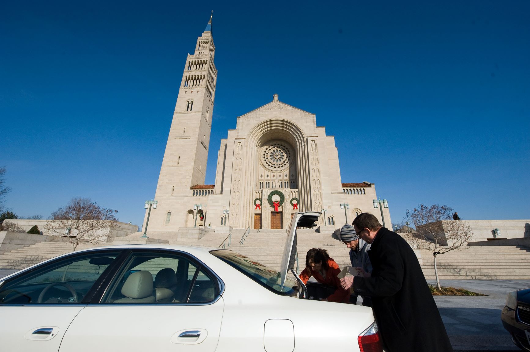 Basilica volunteers pack up meals to deliver to shut-ins at christmas