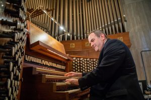 Dr. Peter Latona plays the organ at the Basilica