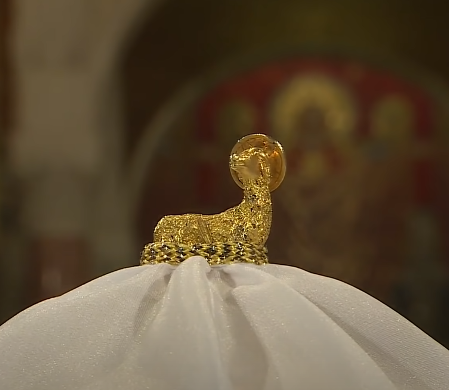 A lamb graces the top of a ciborium at the Basilica