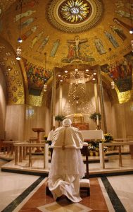 Pope Benedict XVI prays in the Blessed Sacrament Chapel during his visit to the Basilica