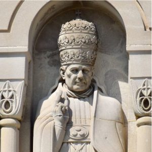 Pope Pius X is carved in relief on the Basilica's east portico