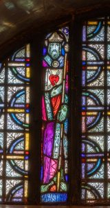 Saint Augustine depicted in a Lunette window in the Basilica.