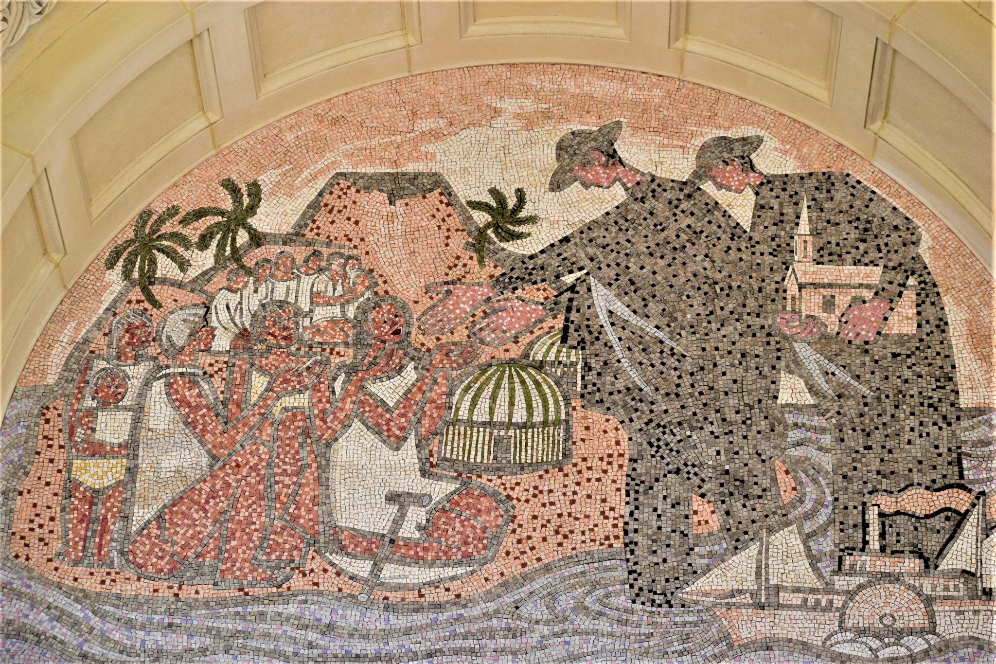 St. Damien portrayed helping the lepers on Molokai in the West Tympana
