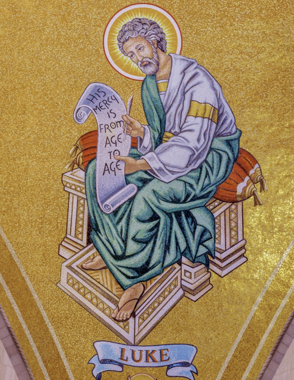Close-up of St. Luke portrayed in mosaic in a Trinity Dome pendentive