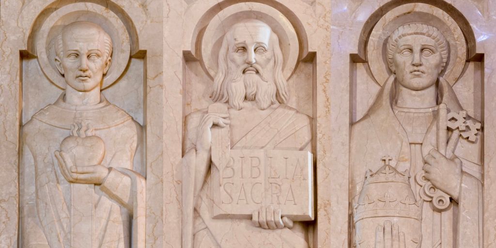 Three saints depicted in marble in the Basilica in Washington D.C.