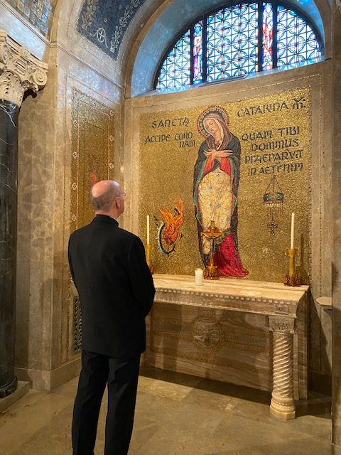 Monsignor Rossi praying in the St. Catherine of Alexandria Chapel